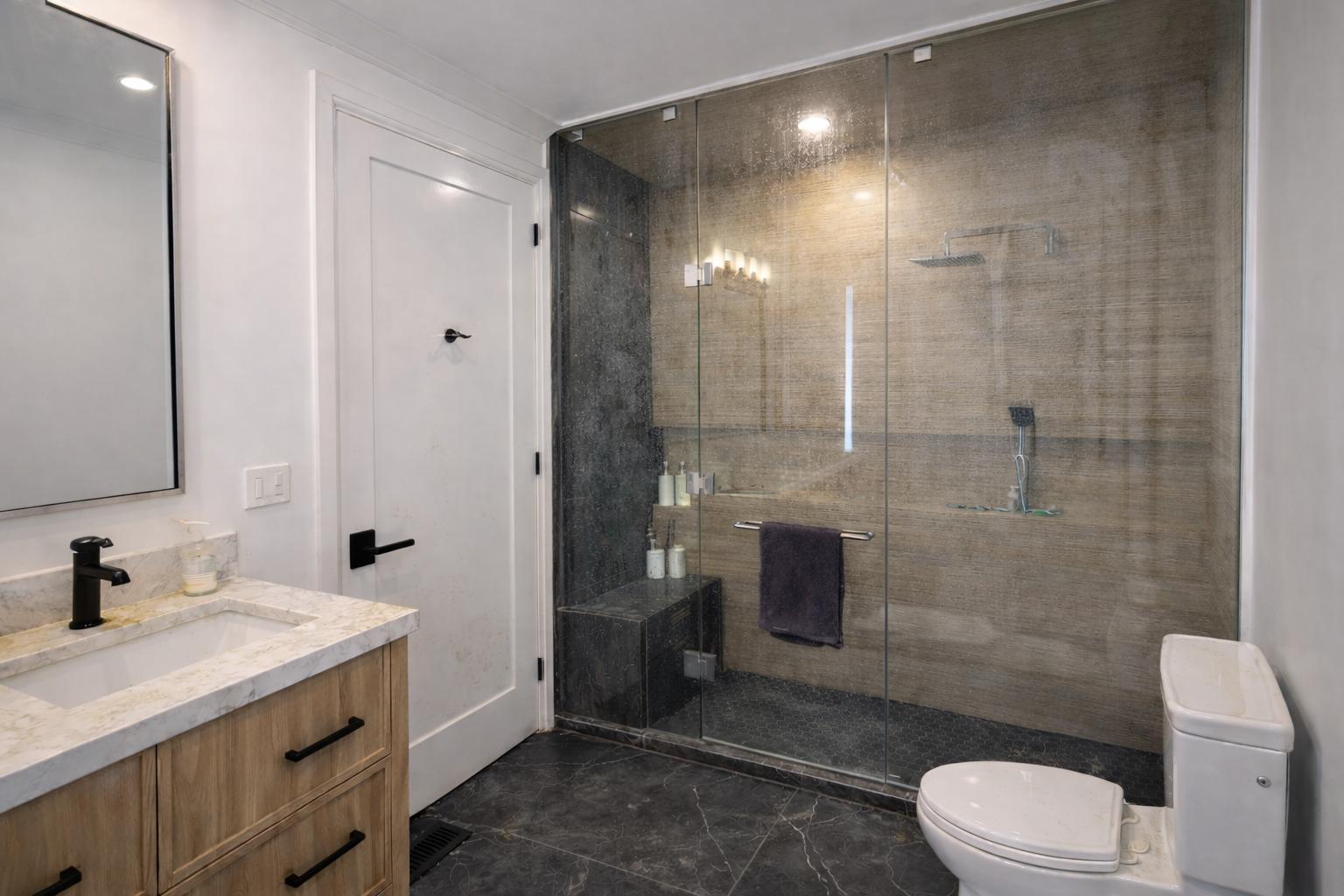 Deep cleaning of glass, fixtures, and surfaces to restore a clean, fresh bathroom look. - Before